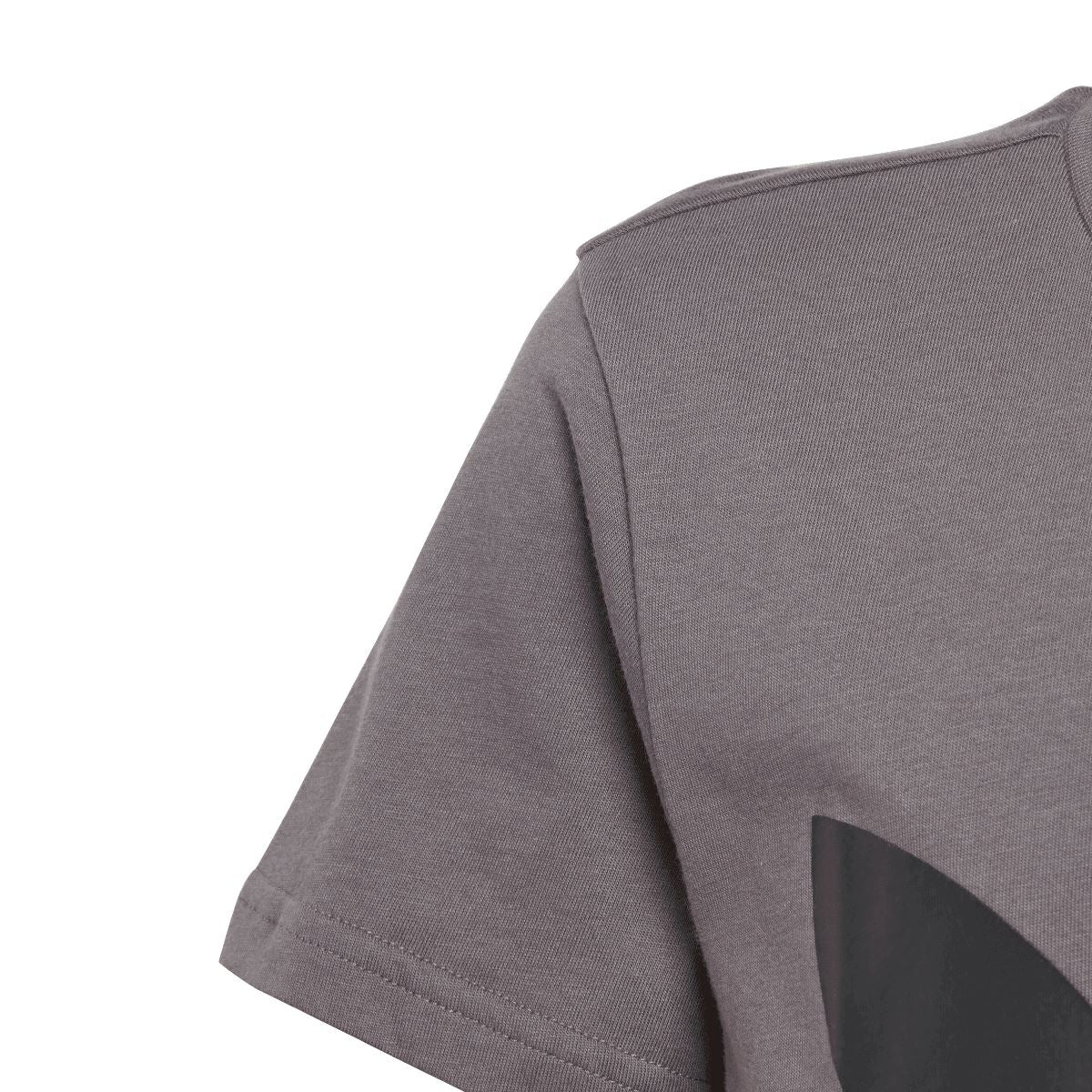 Grey junior T-shirt with short sleeve and side seam detail near the adidas logo.
