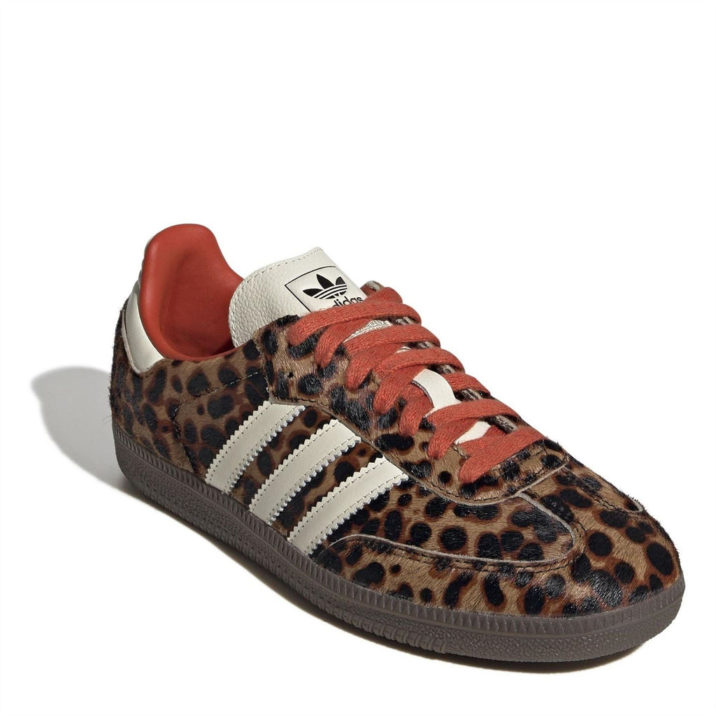 adidas Samba sneakers with leopard upper and red lace-up front, white three stripes