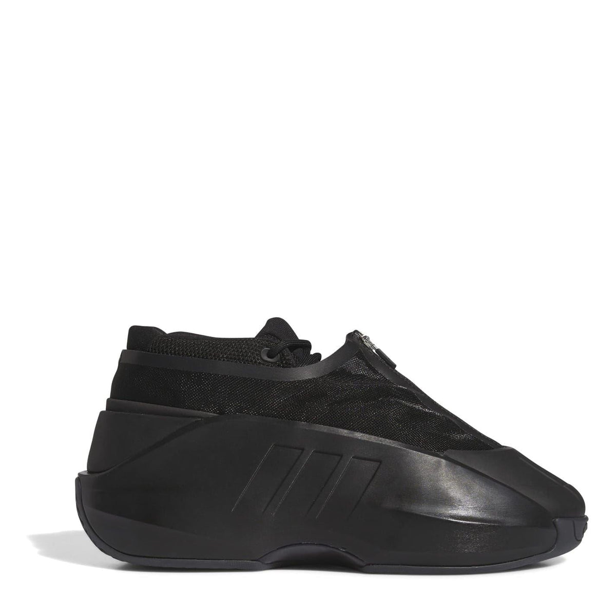 Black infant trainers with knit upper, textured overlays, and molded side panel