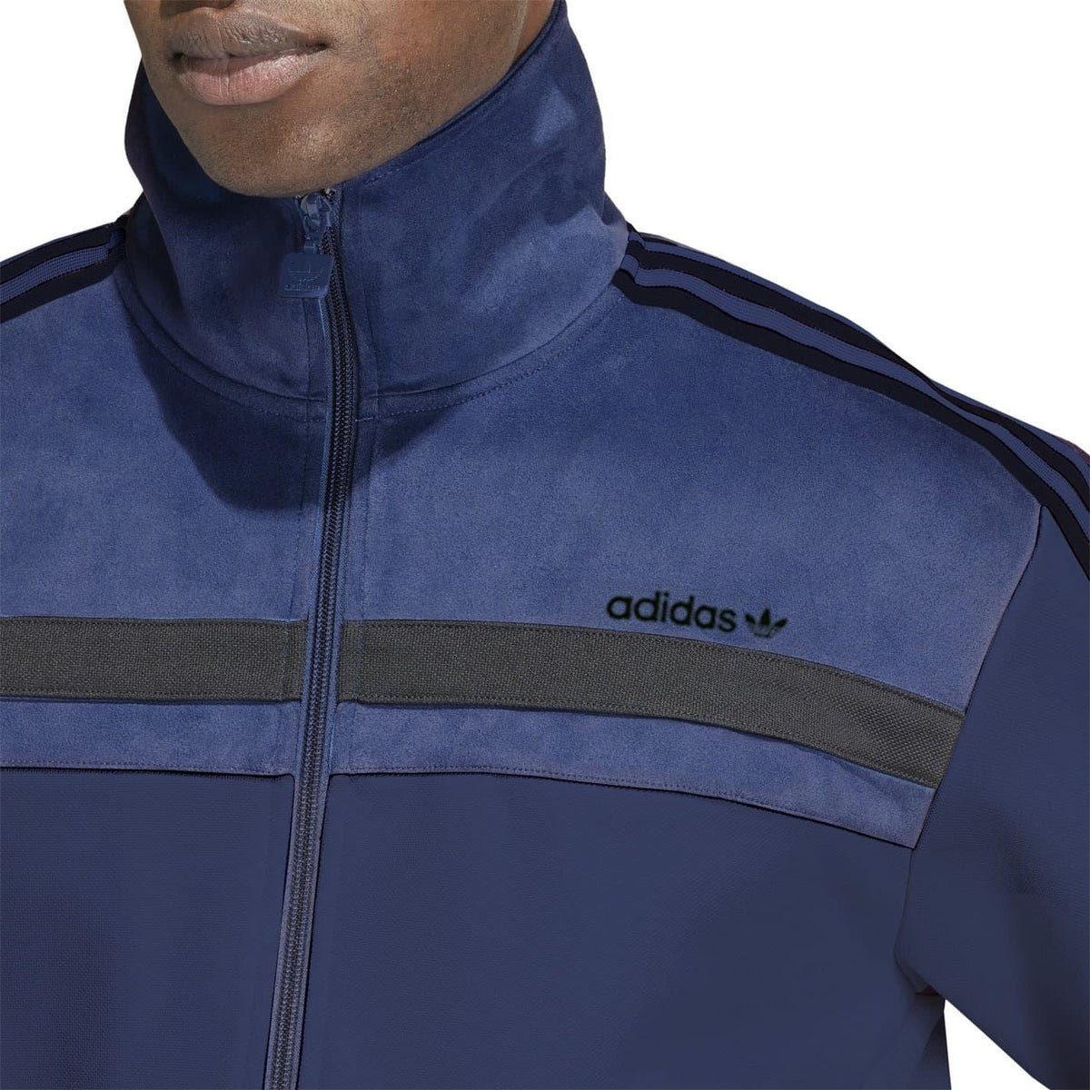 Navy funnel-neck top with adidas trefoil logo and contrast chest stripe panel