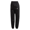 Black adidas Originals track pants with elastic waistband and small thigh logo