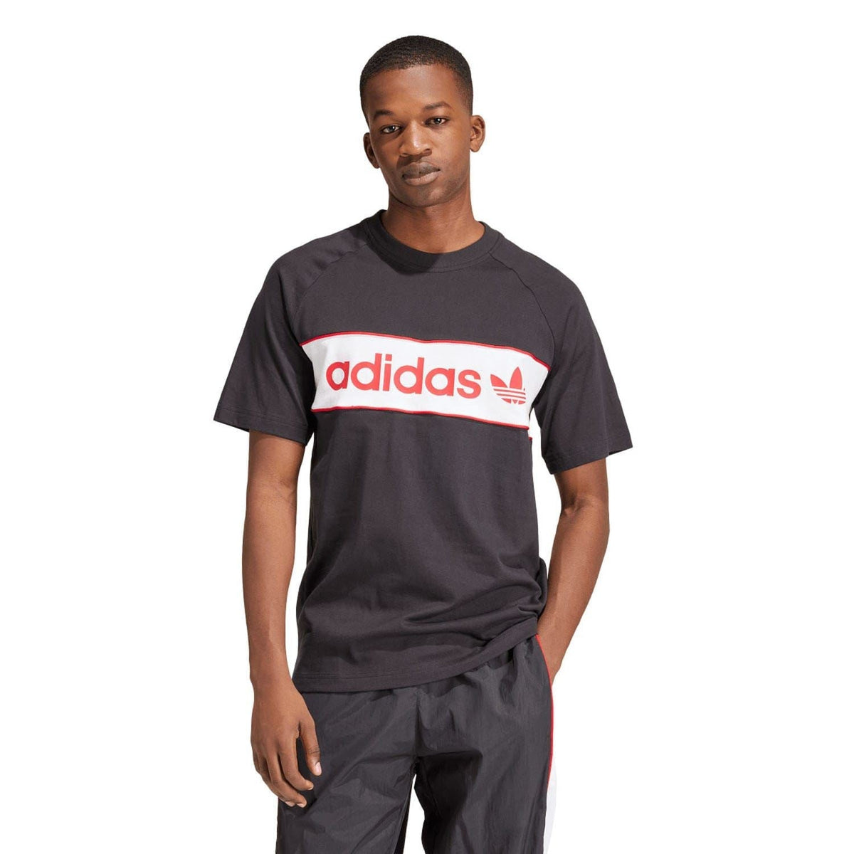 Black T-shirt with red-and-white adidas Originals chest logo band