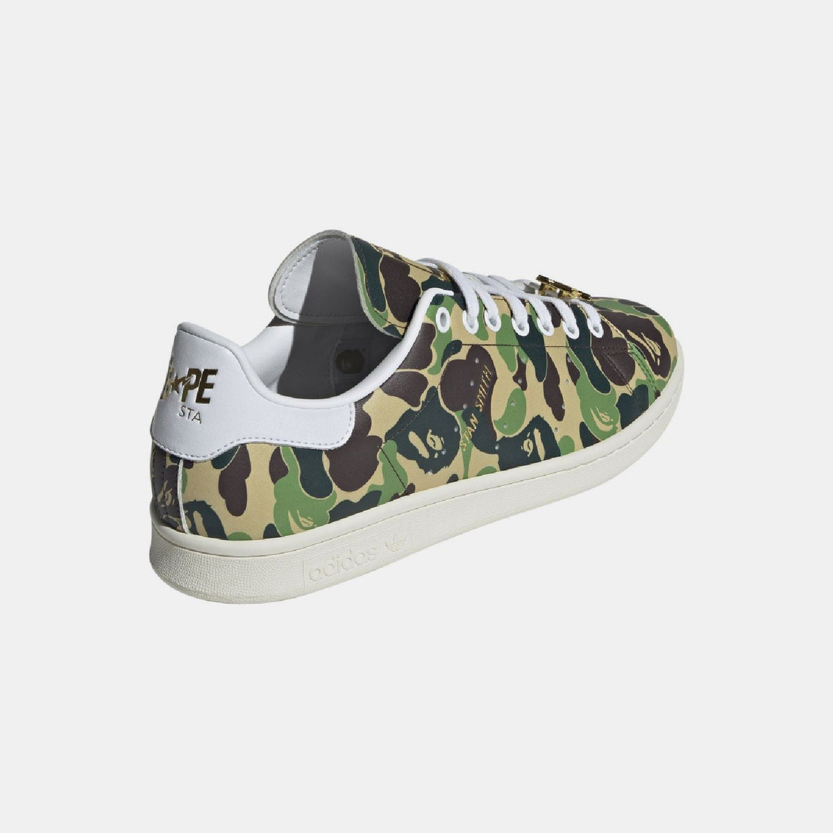 adidas Originals Bape Stan Smith shoes featuring white leather upper, green accents, and classic sneaker design.
