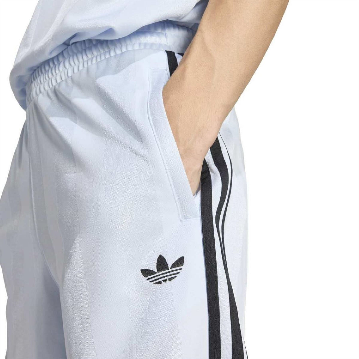 Light blue adidas shorts with trefoil logo and black side stripe trim on the leg