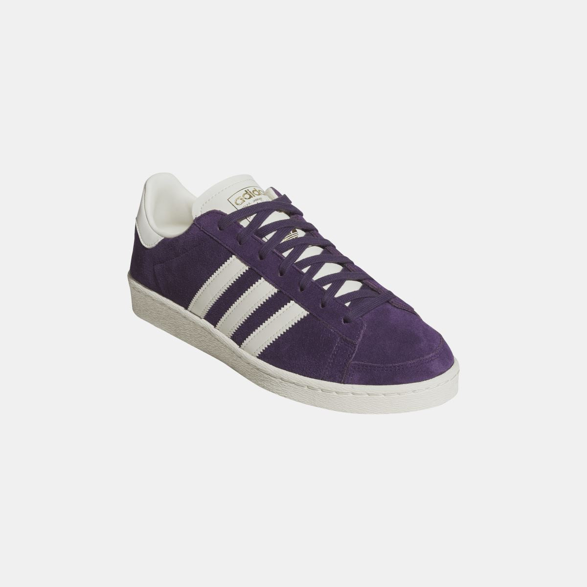 Purple adidas Originals Jabbar Lo sneaker angled side view with white stripes and gray sole