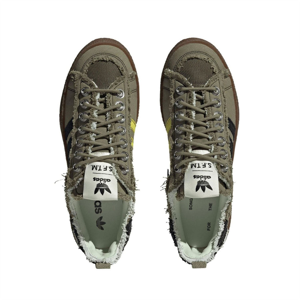 Olive lace-up trainers with tongue lining showing adidas Originals S.F.T.M label