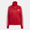 adidas Originals Classic Firebird loose track top sweatshirt in black with white stripe details, displayed on a hanger.