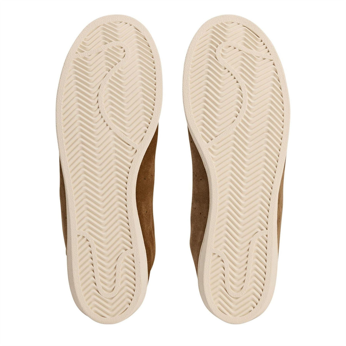 Cream rubber outsoles with herringbone tread for brown high-top sneakers
