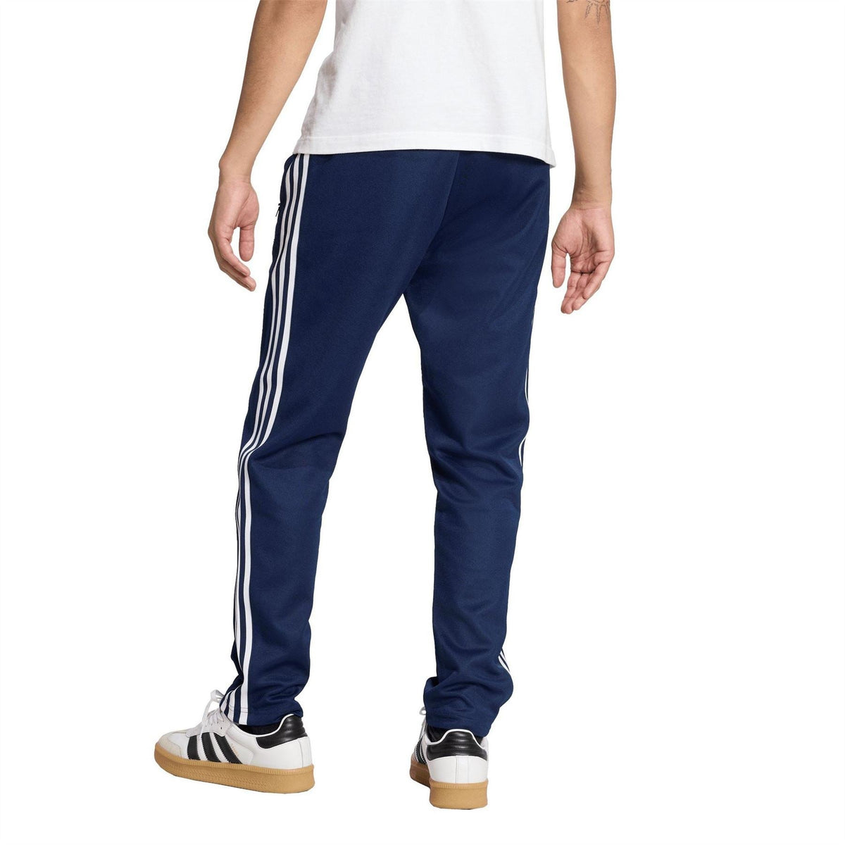 adidas Originals Beckenbauer slim track pants with open hems, navy and white side stripes
