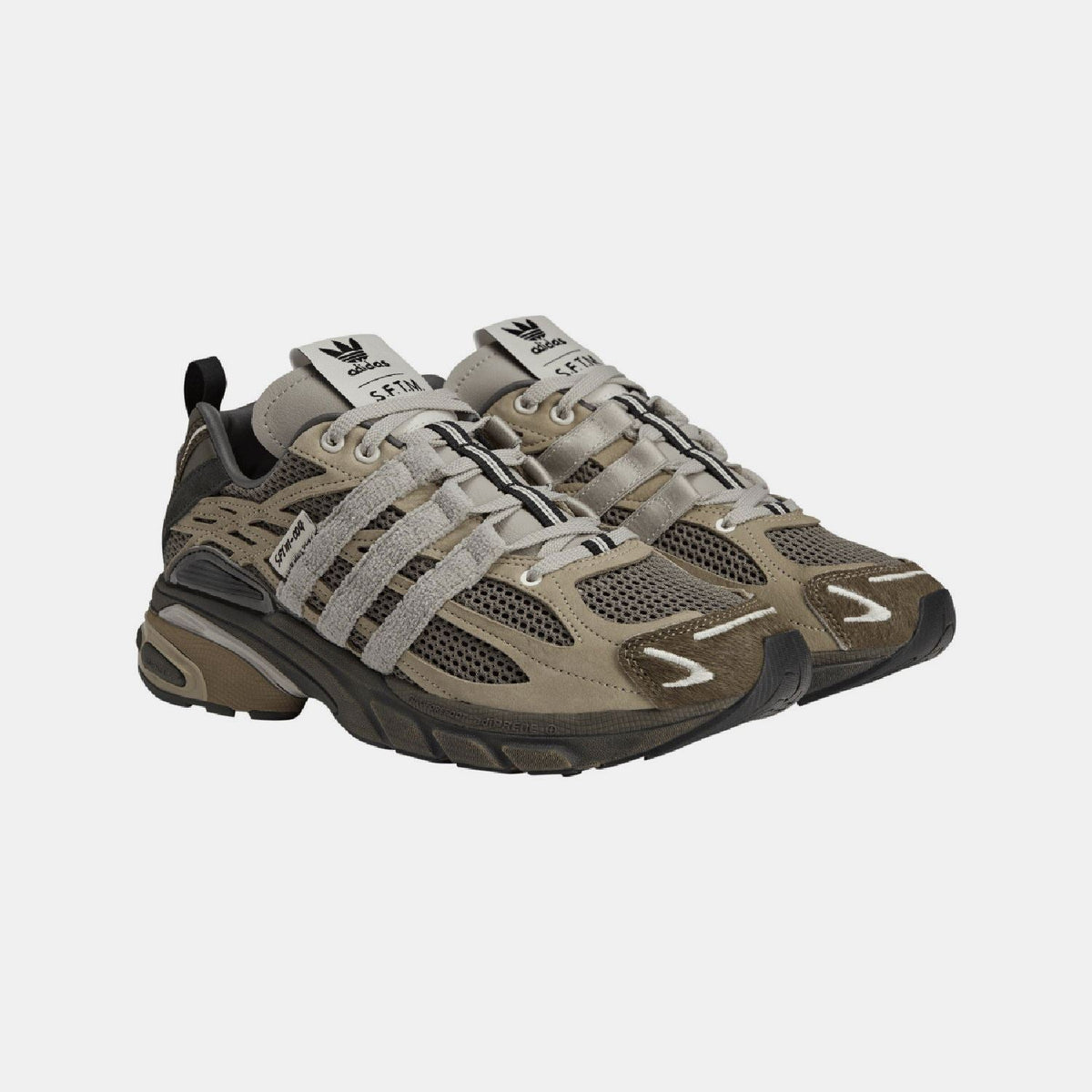adidas Originals Adistar Cushion STFM trainers showing a sleek design with cushioned sole and stylish sporty look