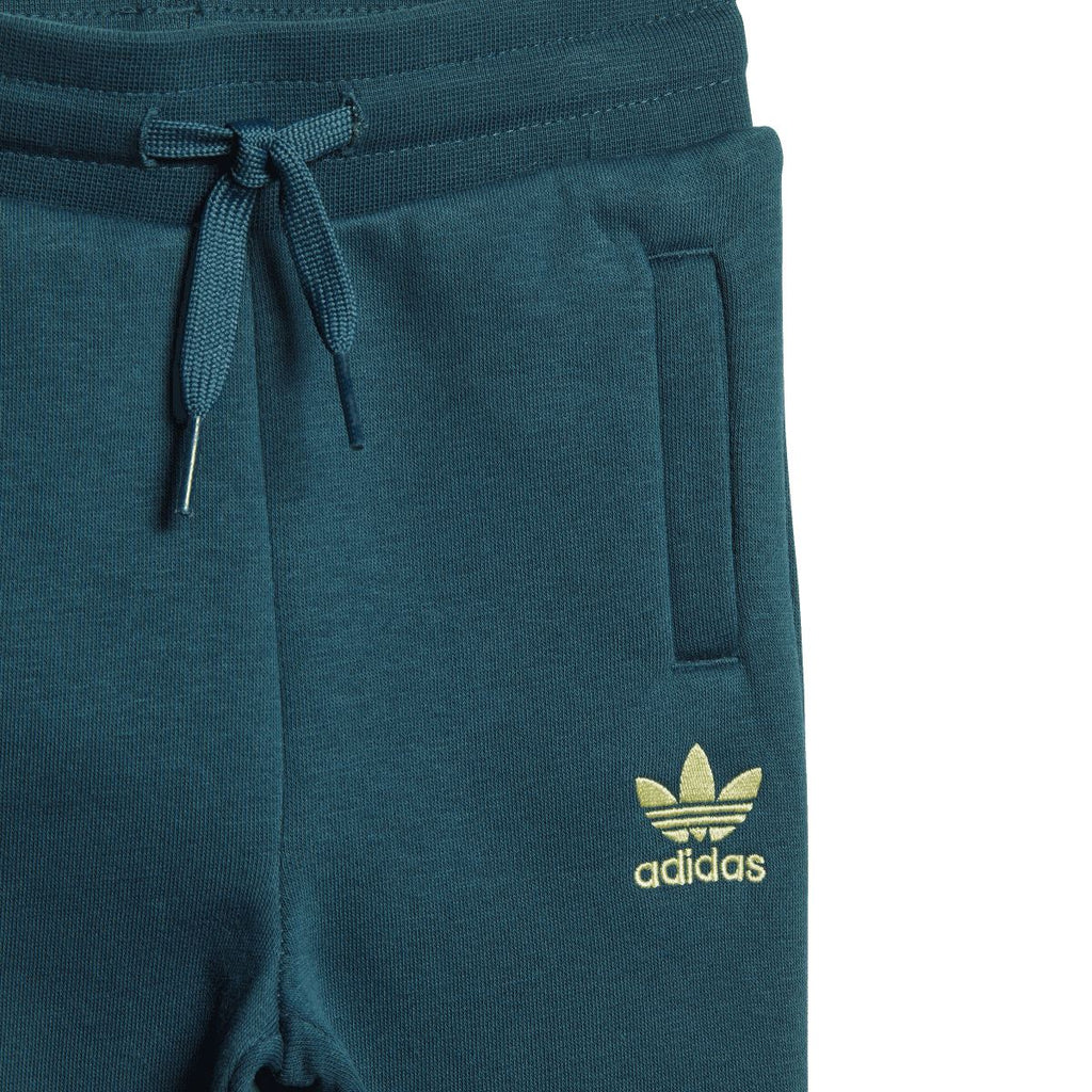 Teal joggers with drawstring waist, side pocket, and gold adidas logo