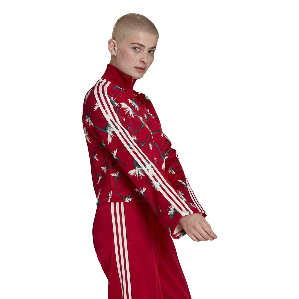 Red side-view athletic top with high neck zip, white stripes, floral print