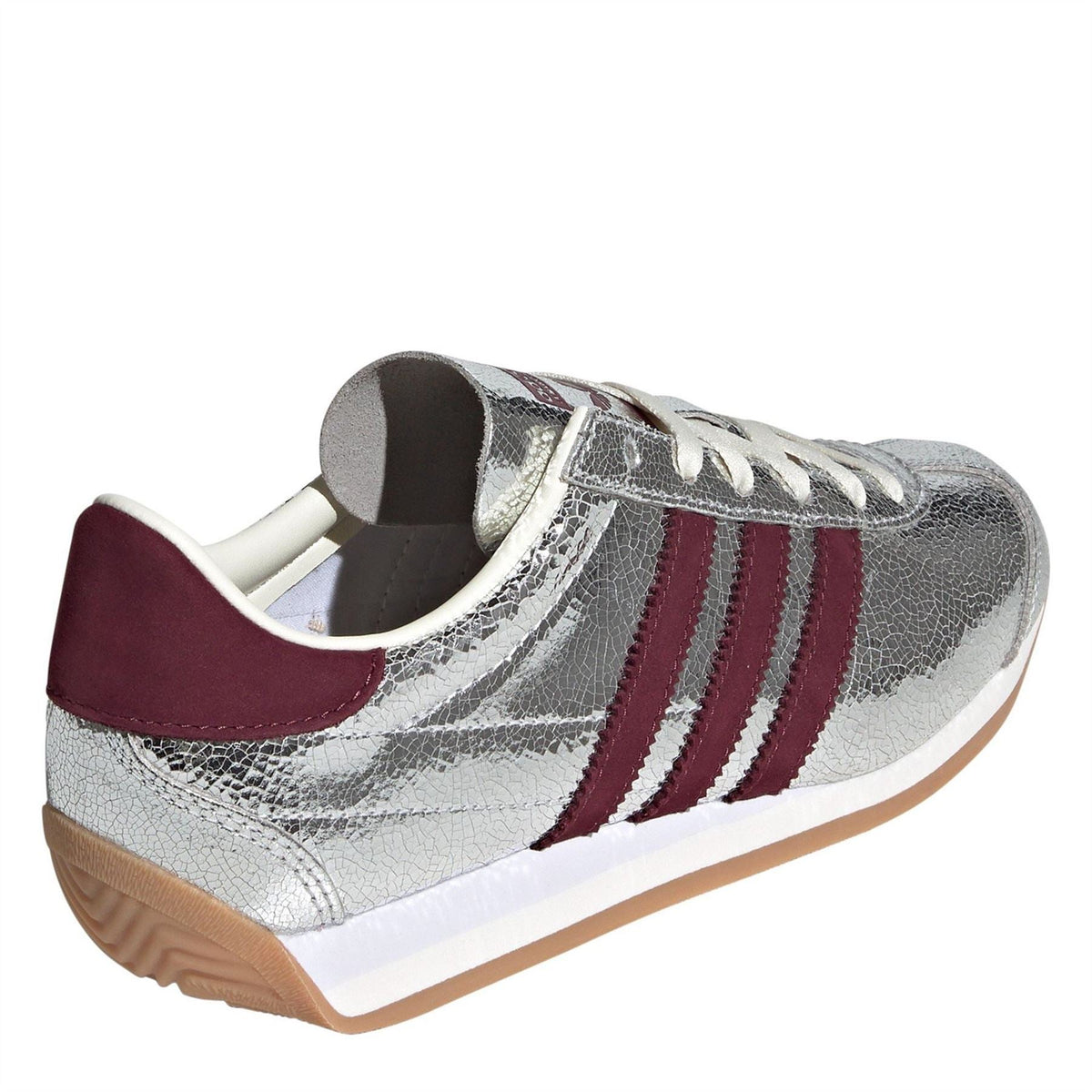adidas Originals Country OG TR footwear showing classic sneaker design in beige and white with textured details