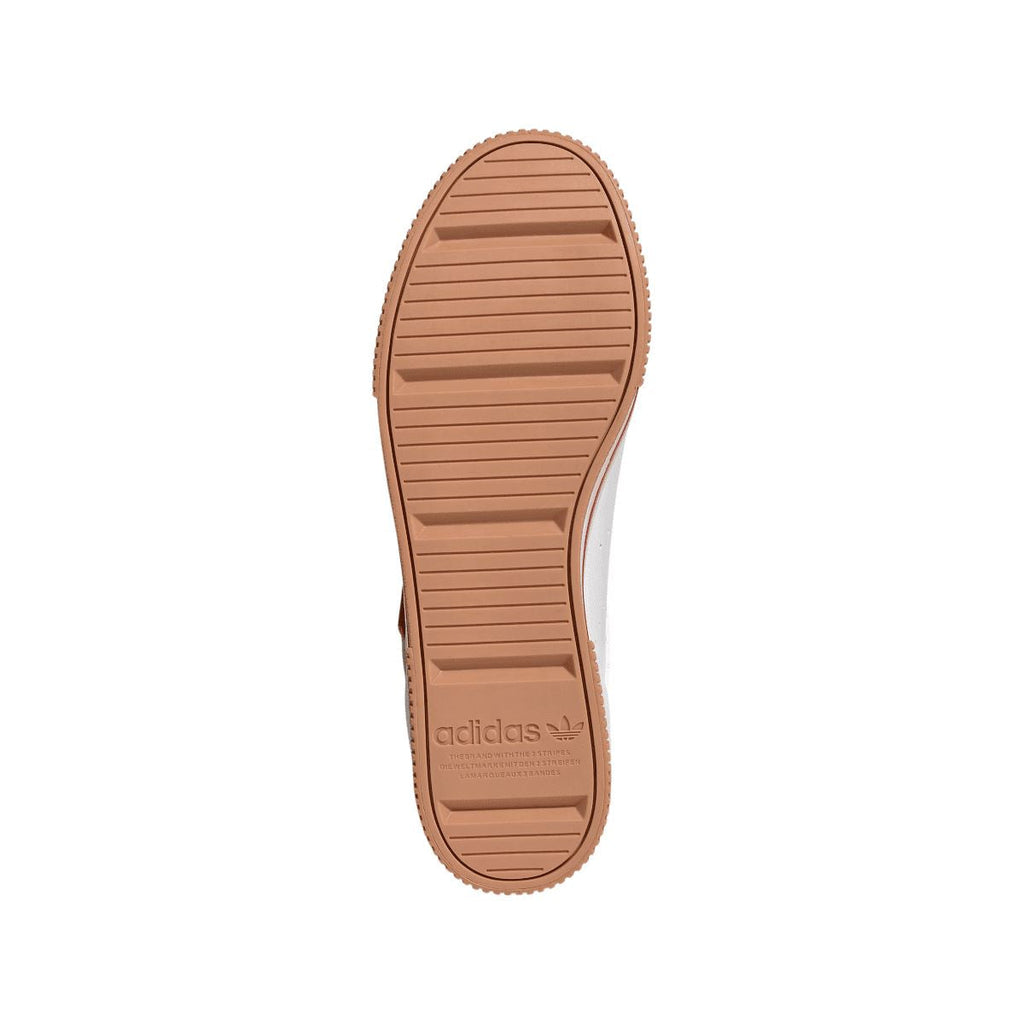 Brown rubber outsole with ridged tread and adidas logo