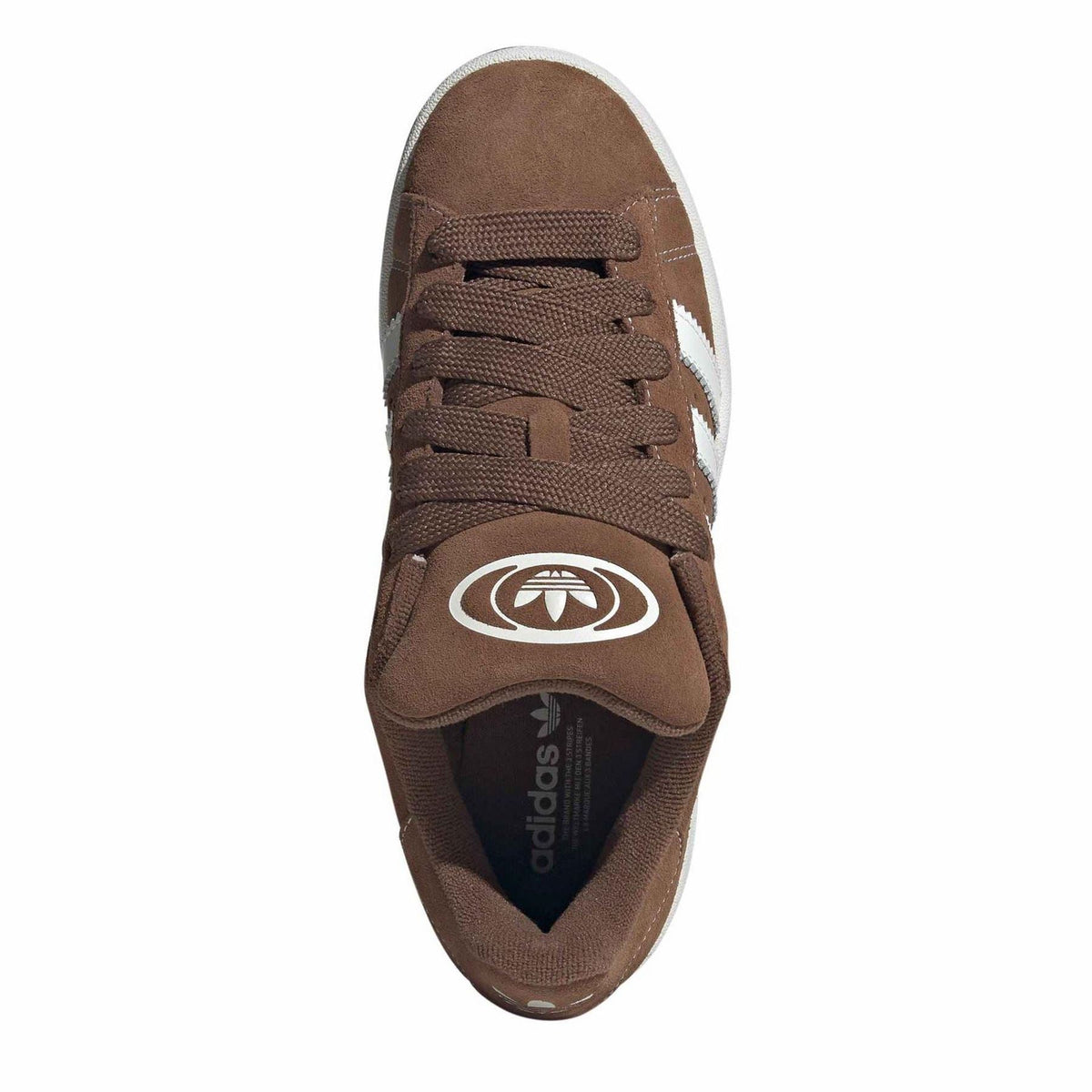 Brown suede lace-up sneakers with adidas logo on tongue and white stripes