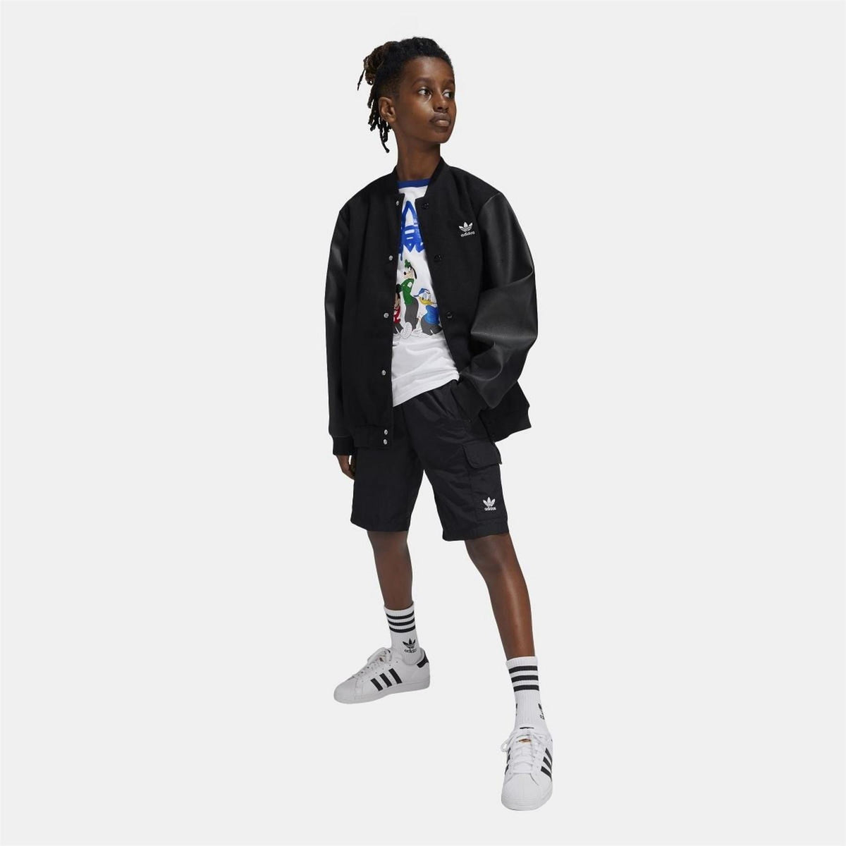 Black cargo shorts with elastic waistband and side flap pockets, adidas logo on hem