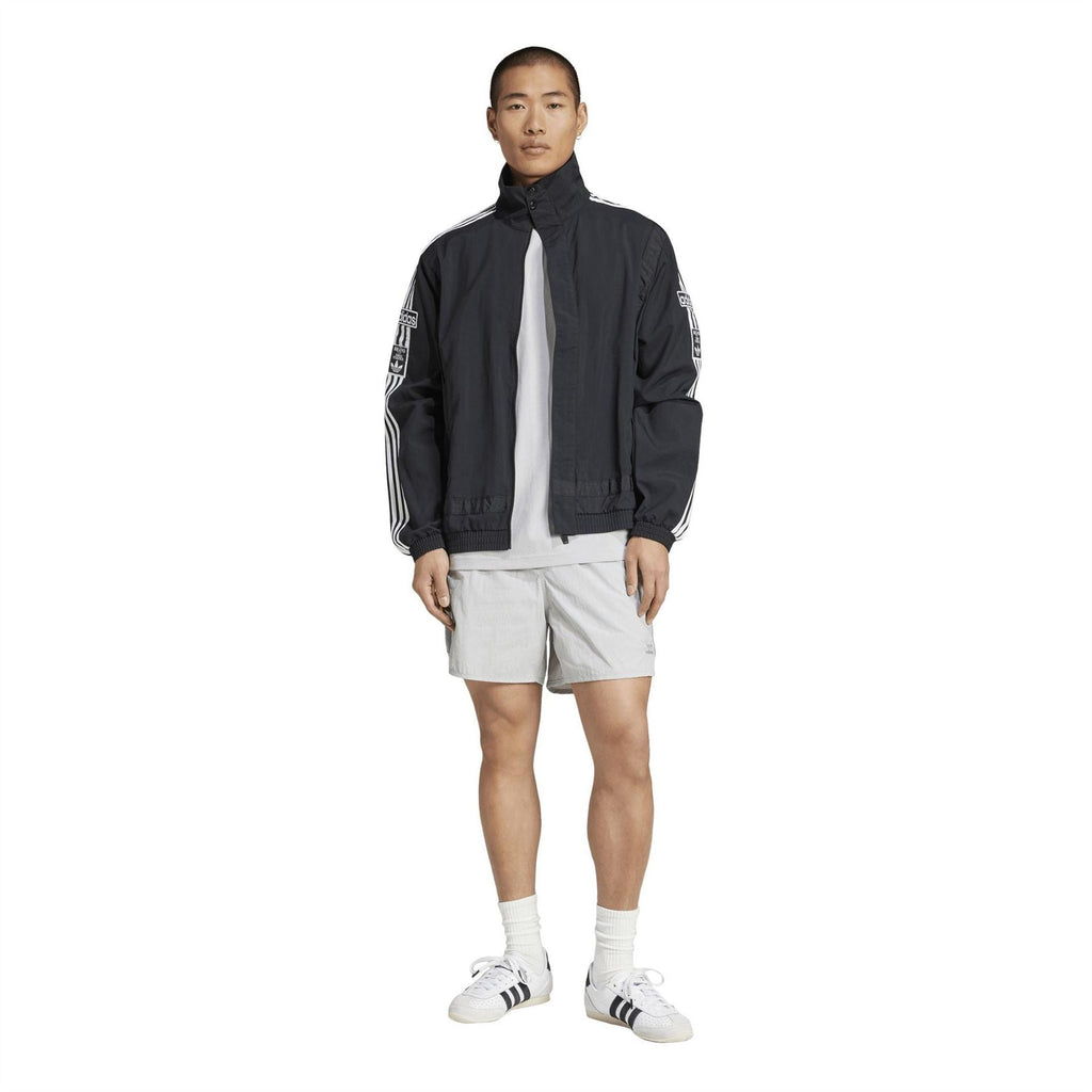 Black adidas zip-up track jacket with front zipper and white adidas logo