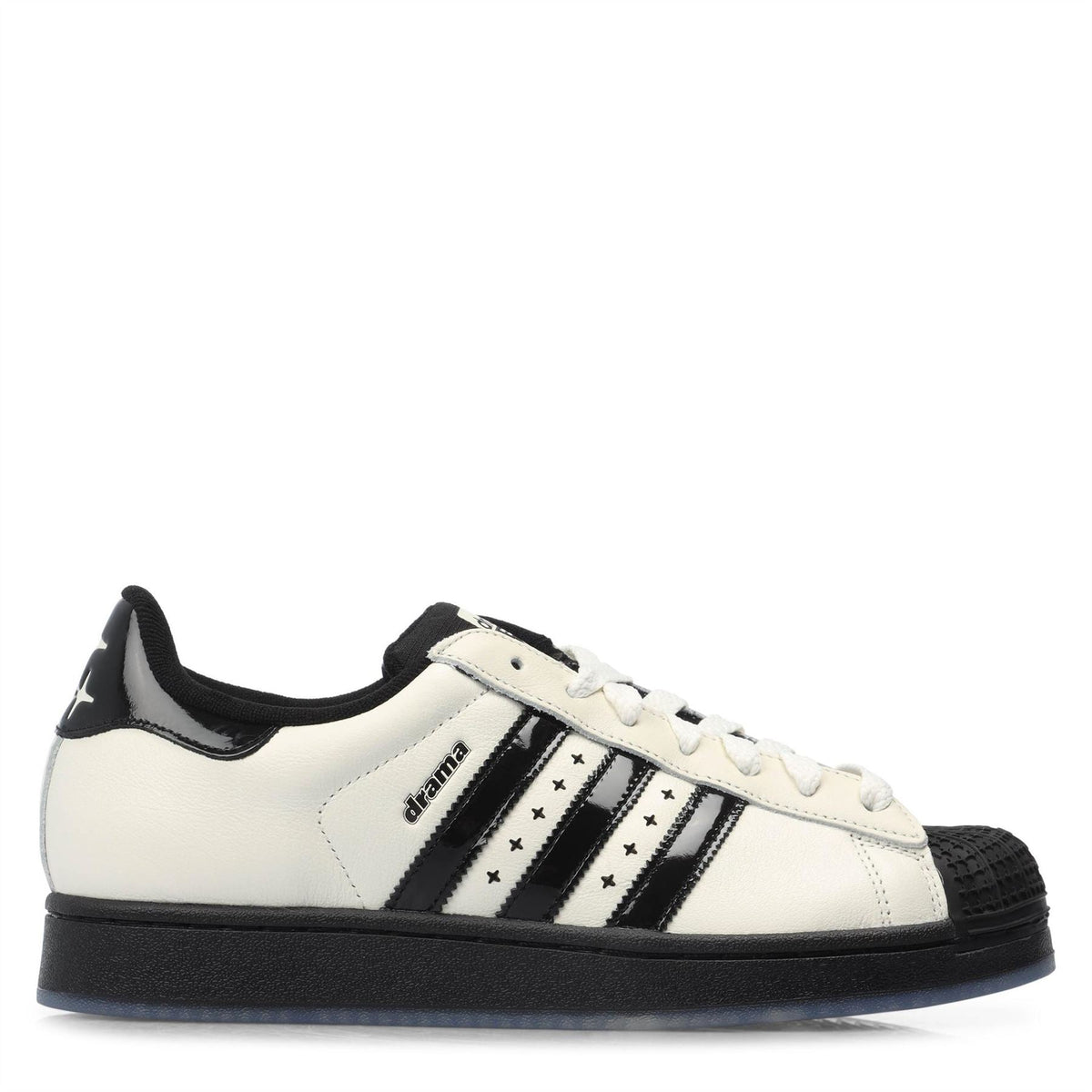 adidas low-top sneakers in off-white and black with lace-up and three stripes