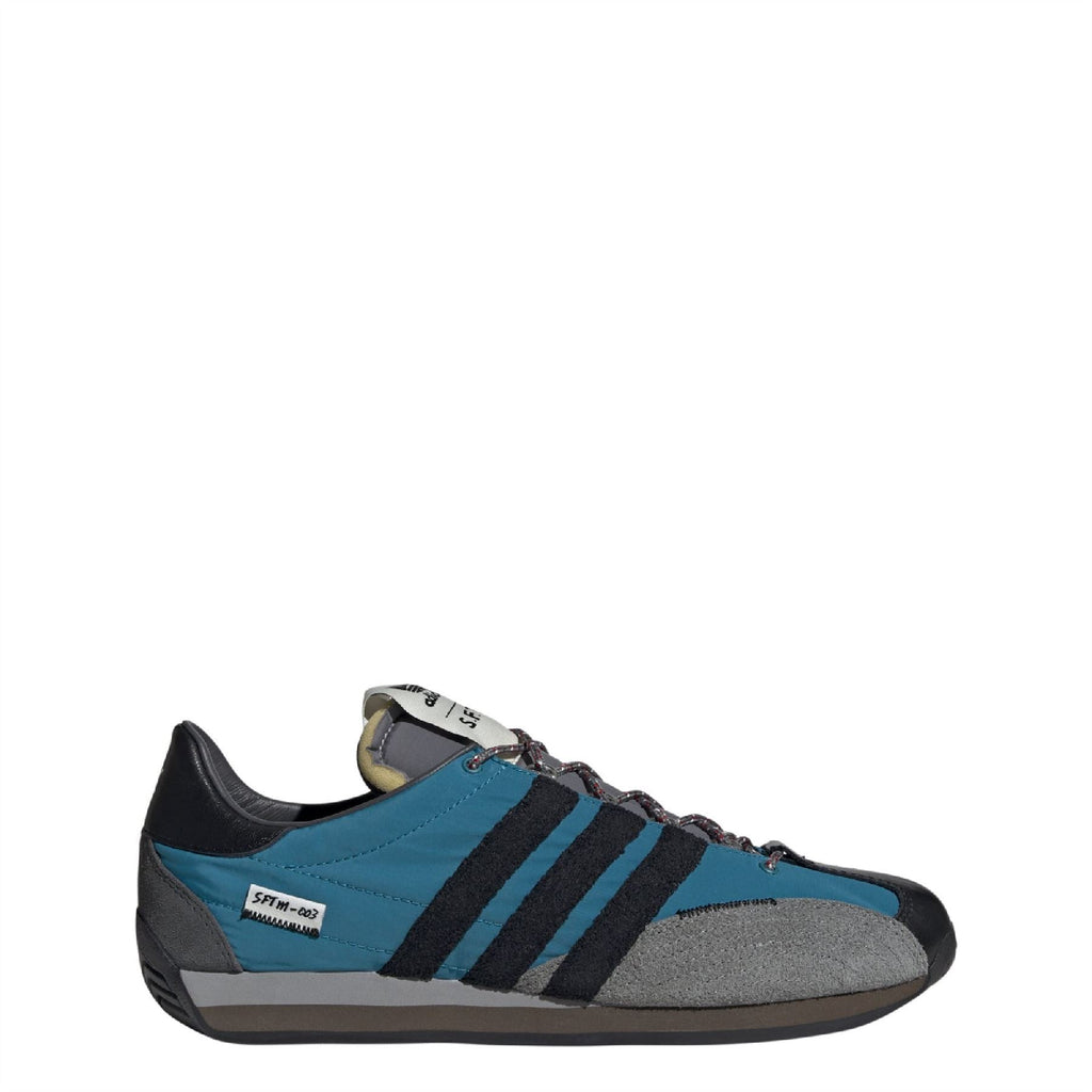 Teal, black and gray lace-up low-top trainers with three stripe detailing and gum sole