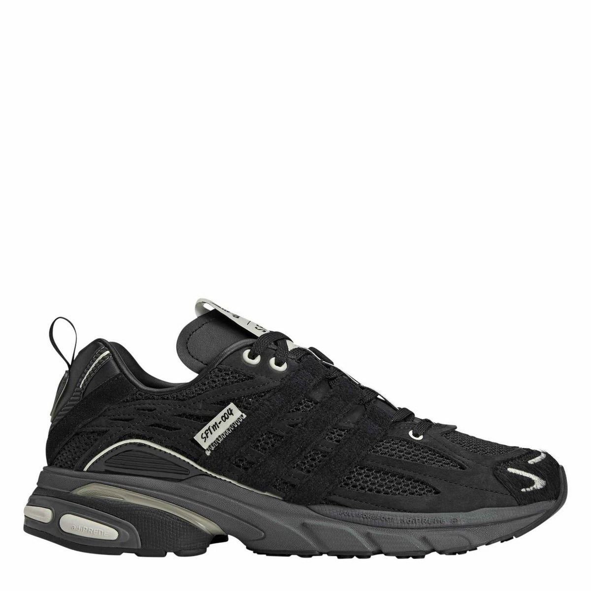 adidas Originals Cushion STFM Trainers in black with white soles, showcasing sporty athletic footwear design and branding.