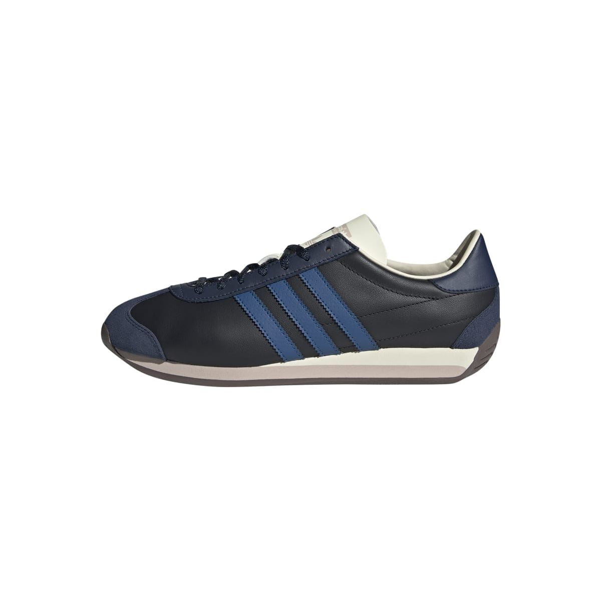 adidas low-top trainers with dark upper, blue stripes, and white rubber sole