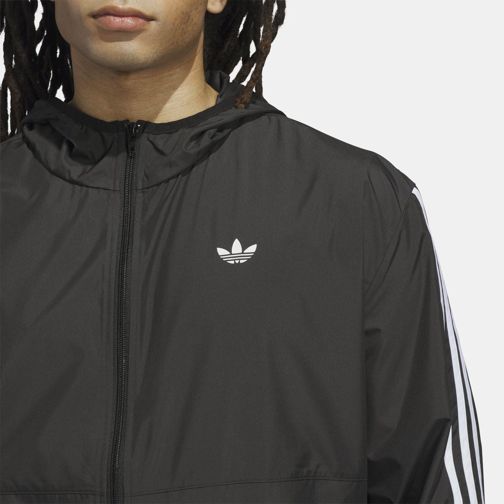 Black adidas Originals windbreaker jacket with white trefoil logo on chest