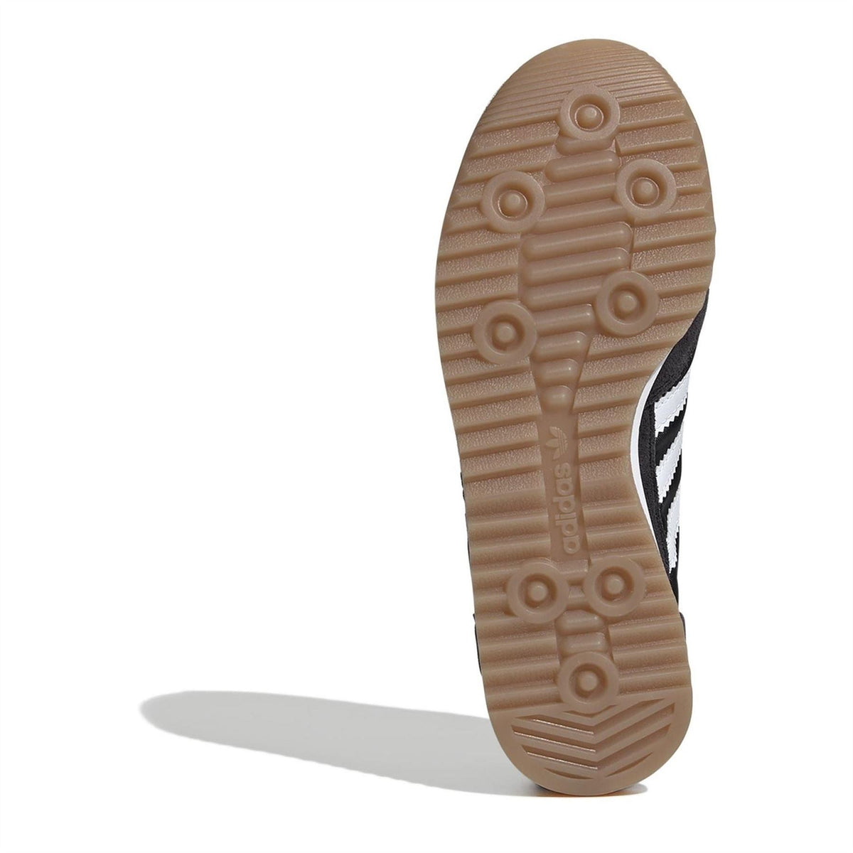Shoe outsole, tan gum rubber tread with adidas logo