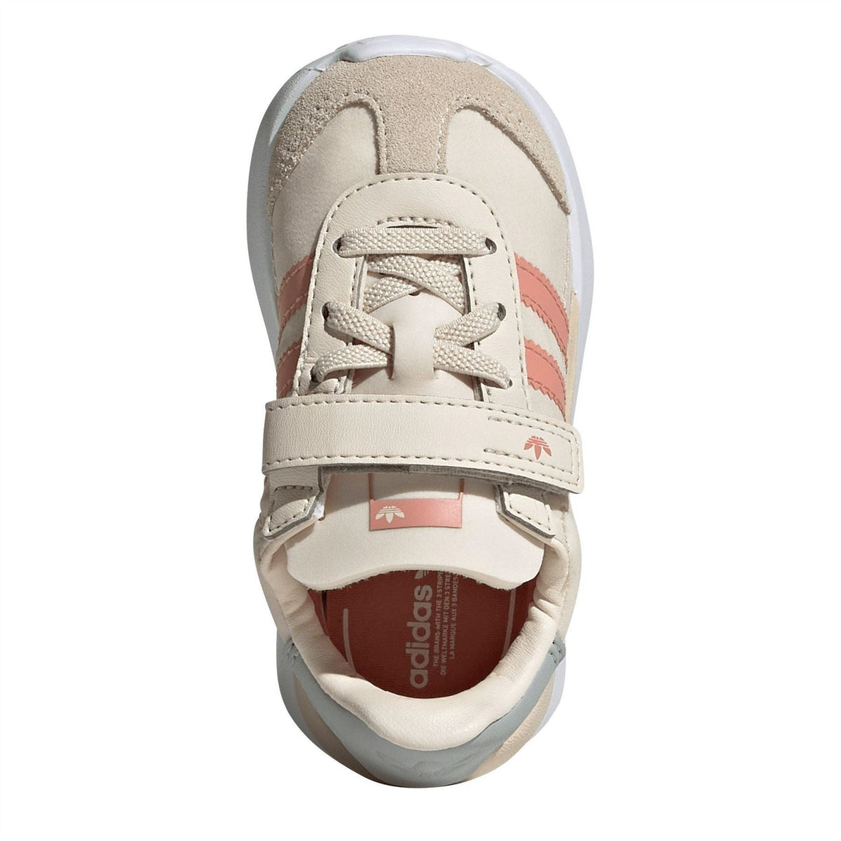 Off-white slip-on trainer with lace-up front, padded collar, and red logo lining