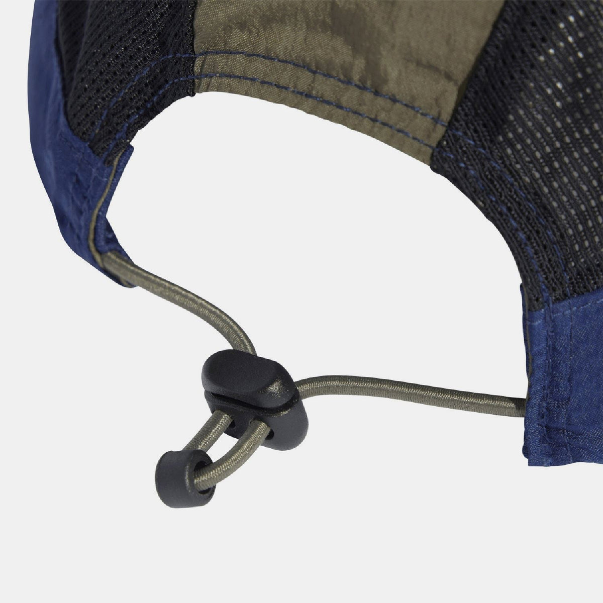 Two-tone cap with adjustable drawcord at back and dark mesh side panel