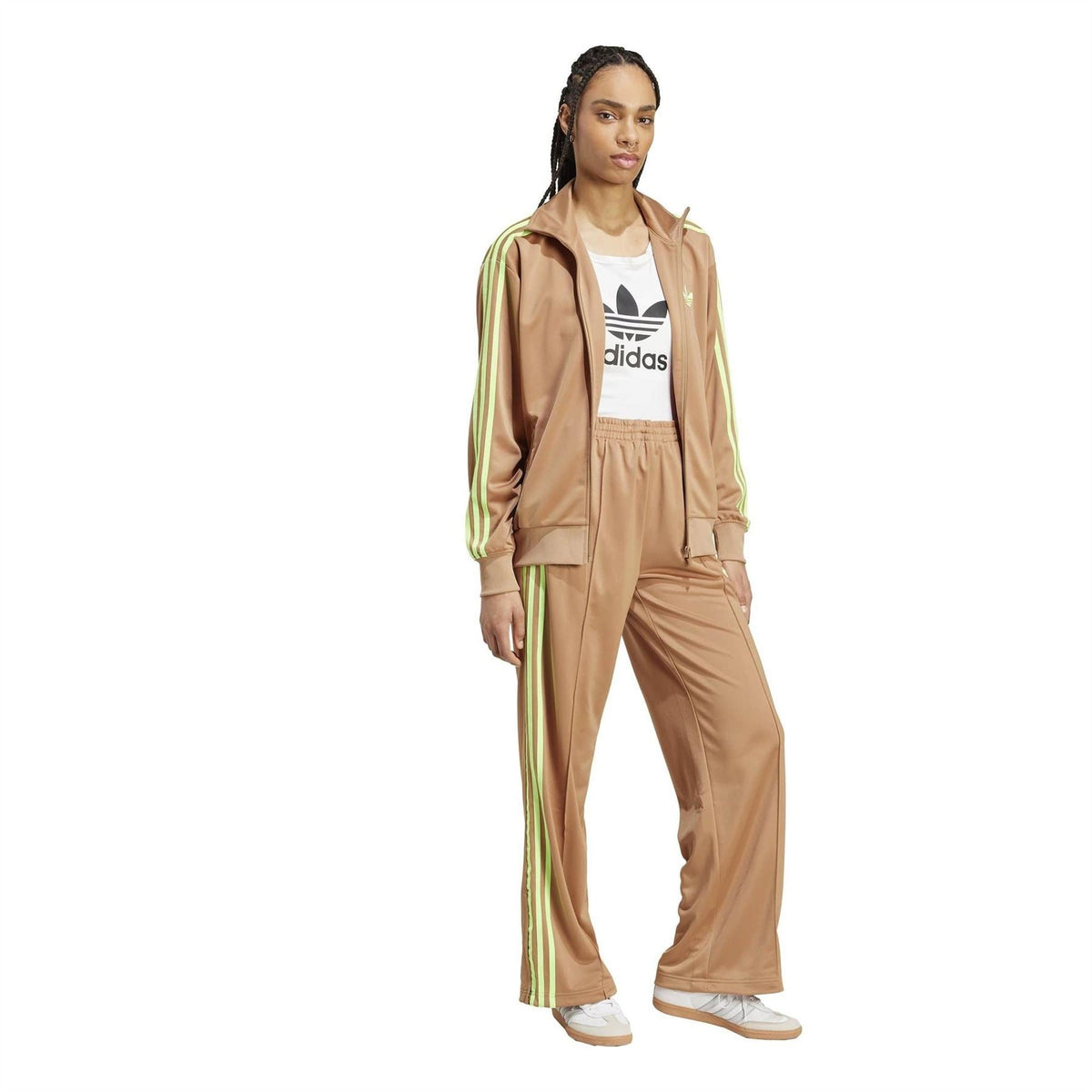 Tan track jacket worn with matching track pants, full zip, stand collar, neon green stripes