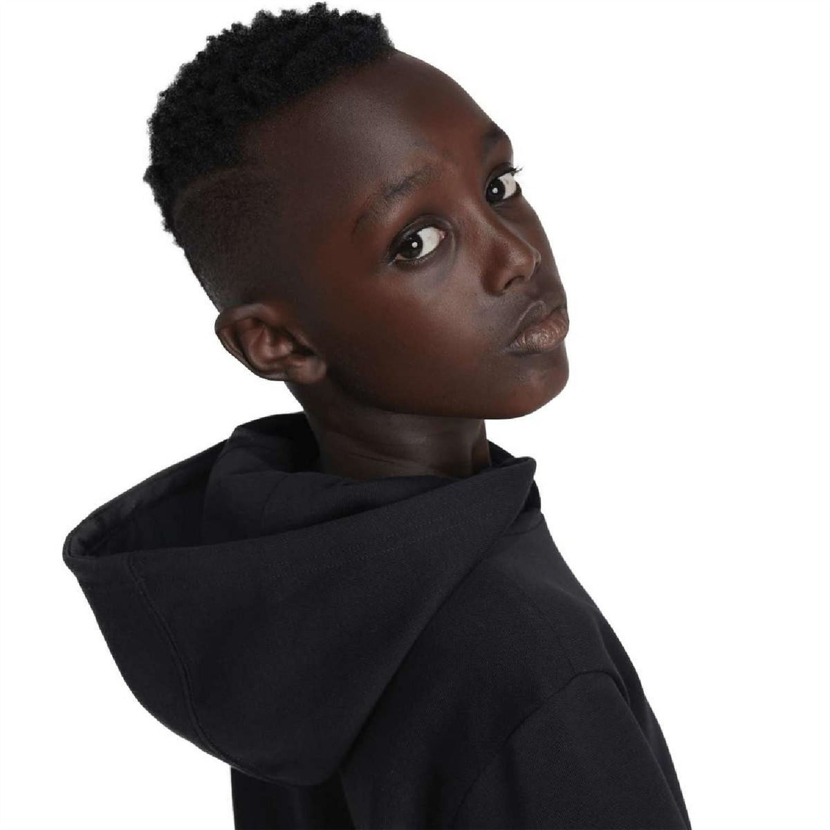 Black hoodie side/back view with raised hood and visible stitching