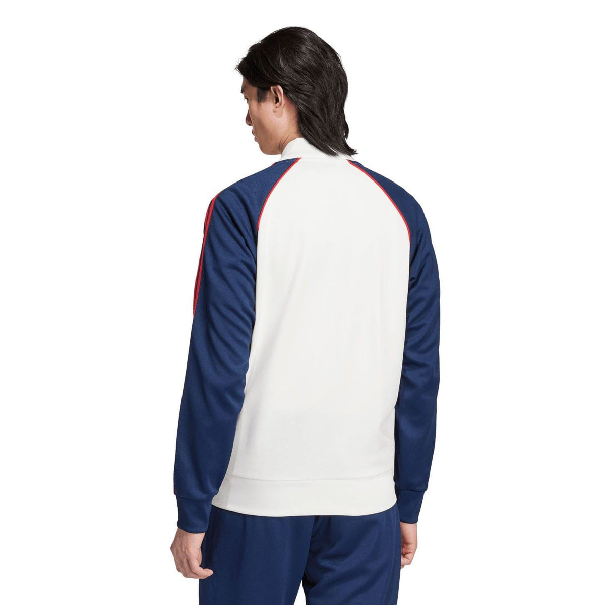 White track jacket back view with navy sleeves and red stripes, ribbed cuffs and hem
