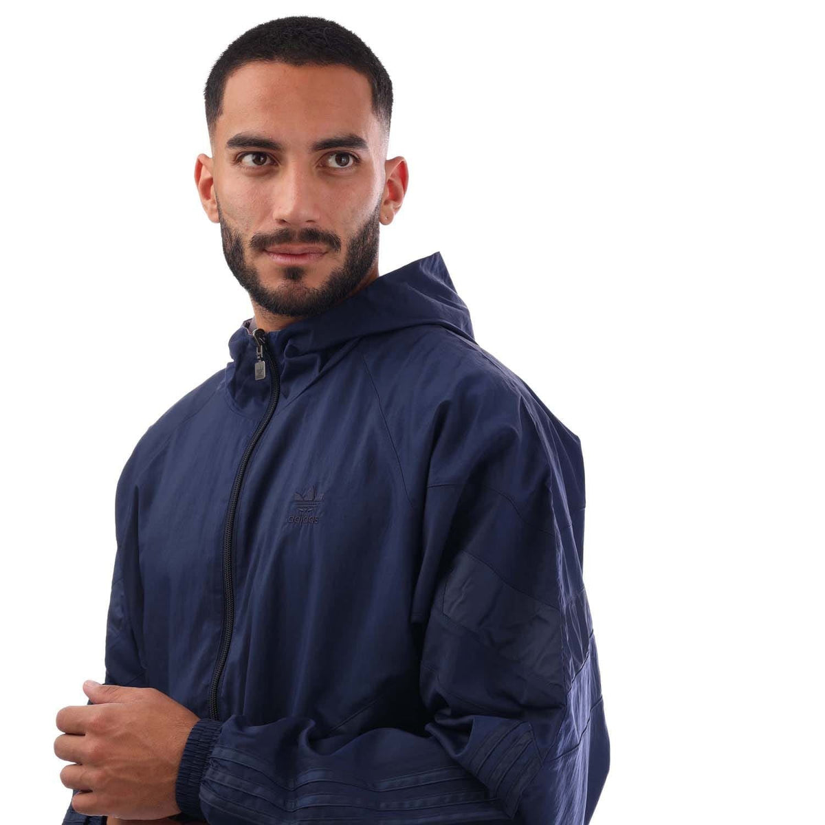 Navy windbreaker with hood and full zip, logo on chest