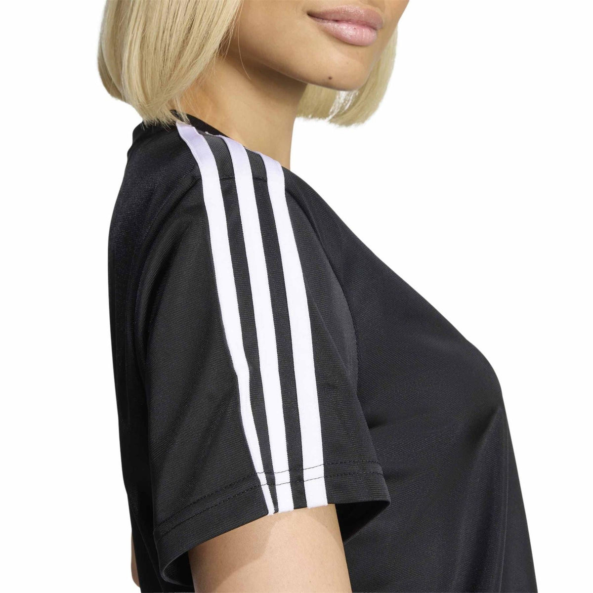Black adidas Originals Firebird T-shirt side view with vertical white stripe detail