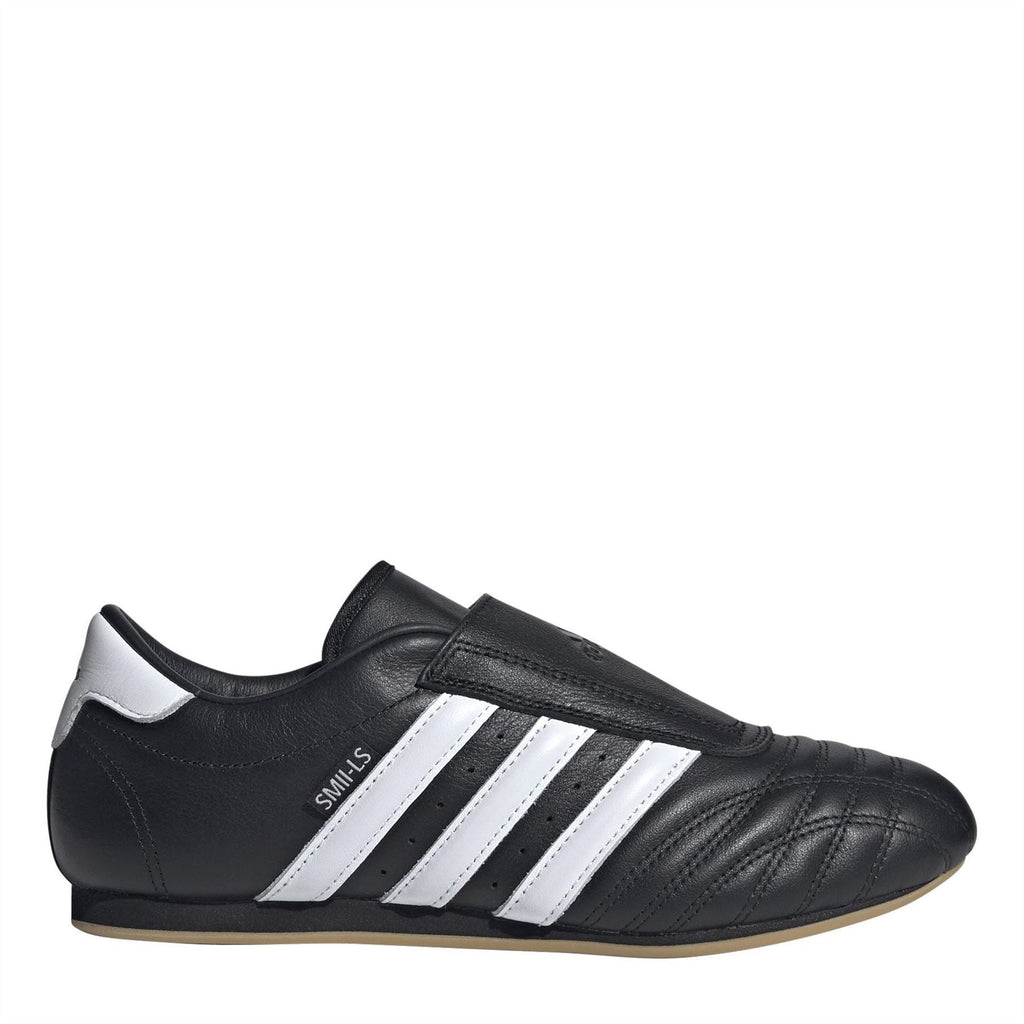 adidas Originals Adidas Taekwo footwear showing sleek black and white athletic sneakers with sporty design and logo accents