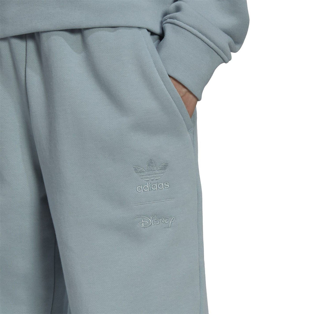 Grey joggers with adidas and Disney logos on the leg