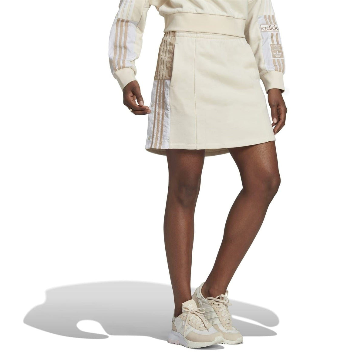 Light mini skirt with elastic waist and vertical striped side panels