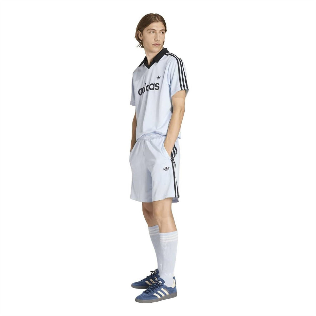 Light blue adidas Originals shorts with black Adidas logo and triple-stripe accents