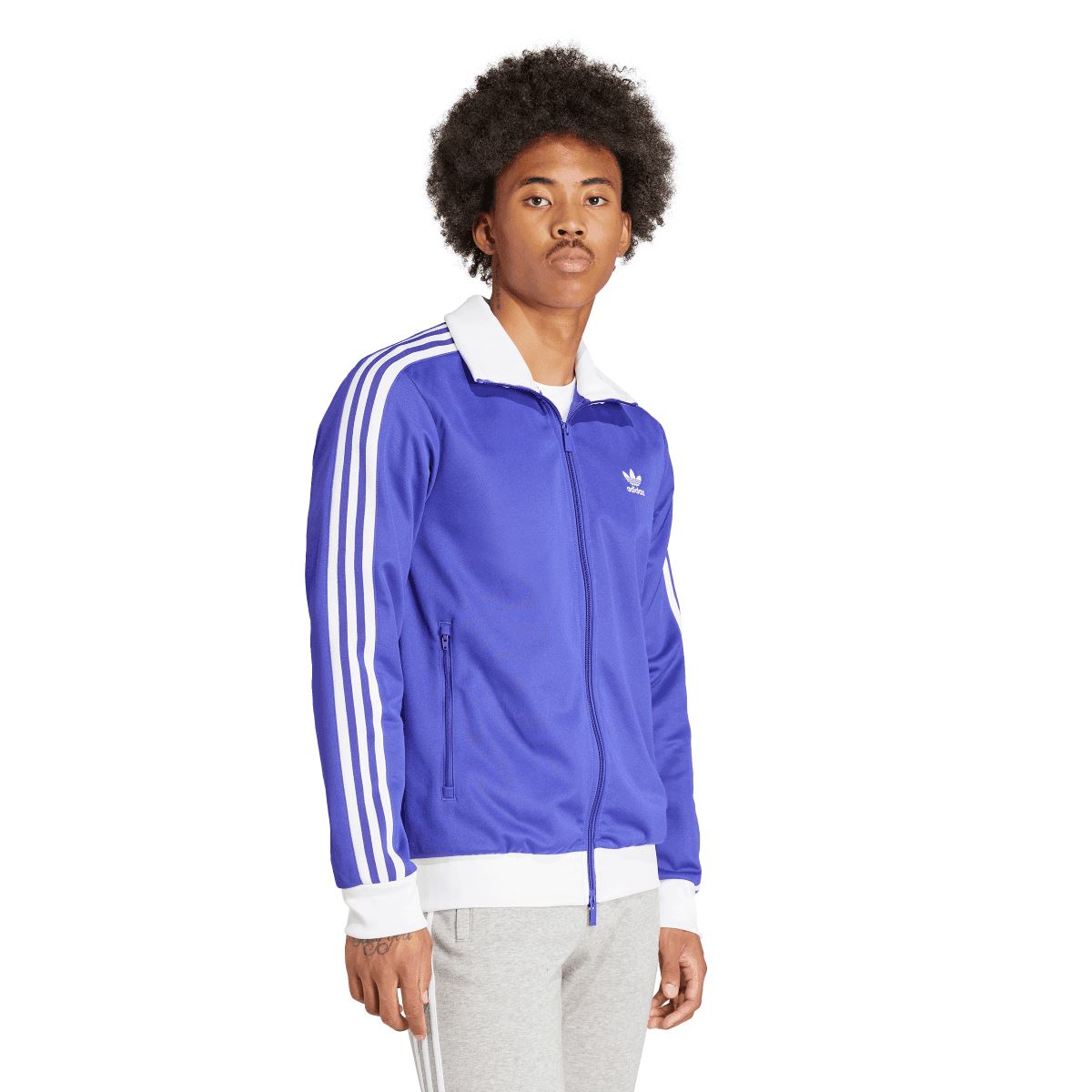 Purple adidas track jacket with white sleeve stripes and chest trefoil logo, full zip