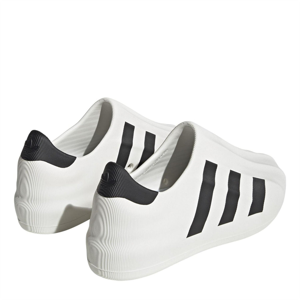 adidas Originals Superstar Slip On Trainers in white with iconic shell toe design and casual slip-on style.