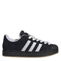 adidas Originals Superstar sneakers in black with white triple stripes and gum sole