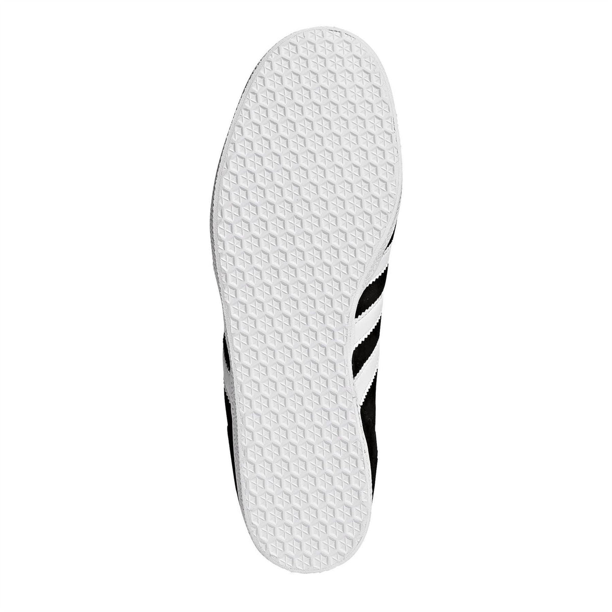 adidas black and white low-top sneakers, textured white rubber outsole view