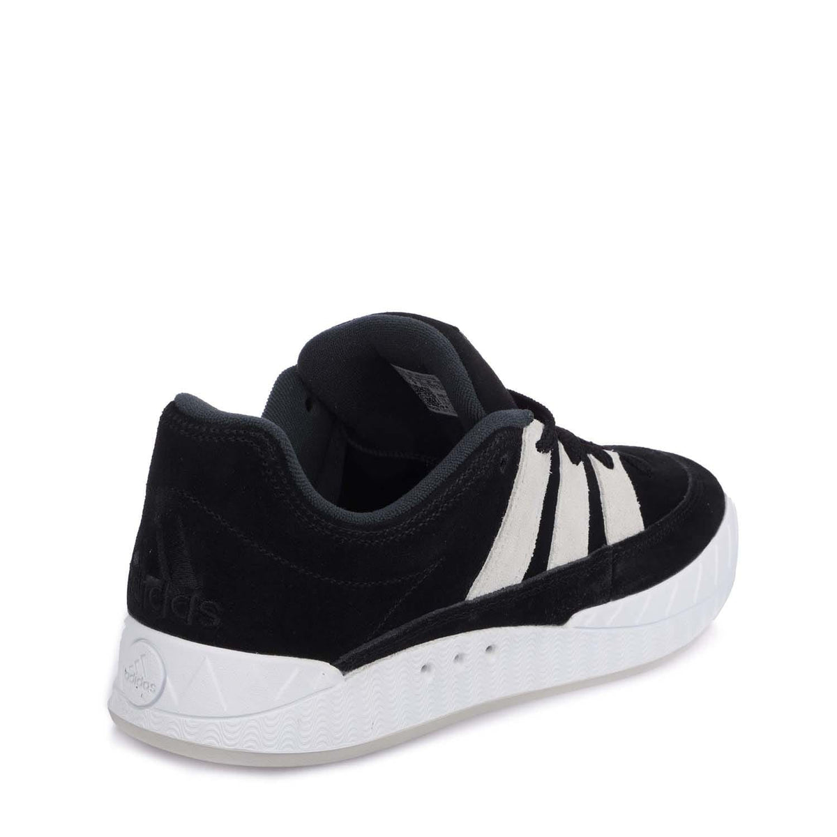 Black adidas Originals Adimatic low-top trainers with white stripes and cushioned sole