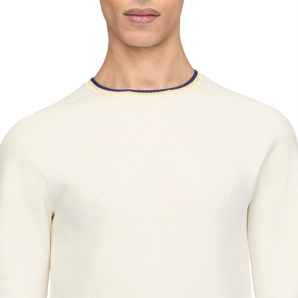 Cream knit crewneck neckline with navy collar and yellow edge trim