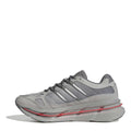 Dark grey low-top lace-up sneakers with 3 stripes and red-accented sole