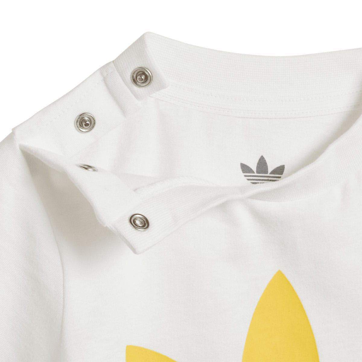 Infant white t-shirt with yellow adidas trefoil, snap-button collar and small logo on chest