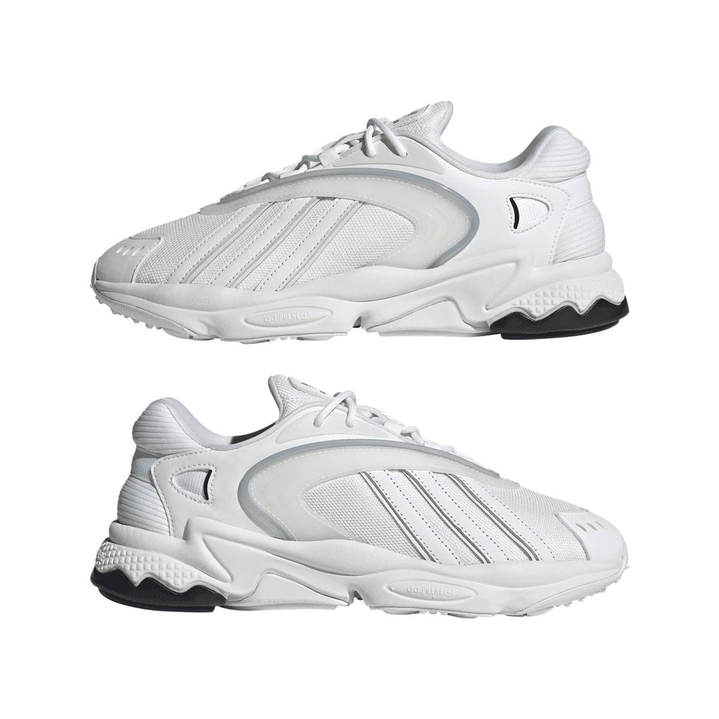 Set of white adidas Originals Oztral trainers, lace-up front with chunky white sole