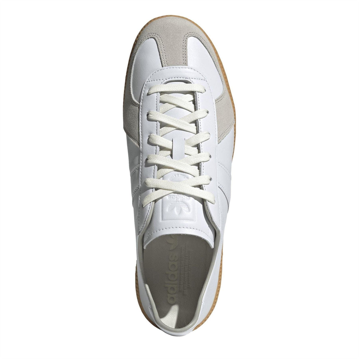 White lace-up trainers with gray heel panel and cushioned tongue