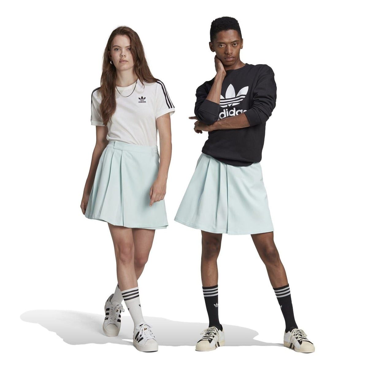 Adidas Originals Adicolour contemporary tailored skirt, stylish and versatile skirt with a sleek design, displayed on a plain background.