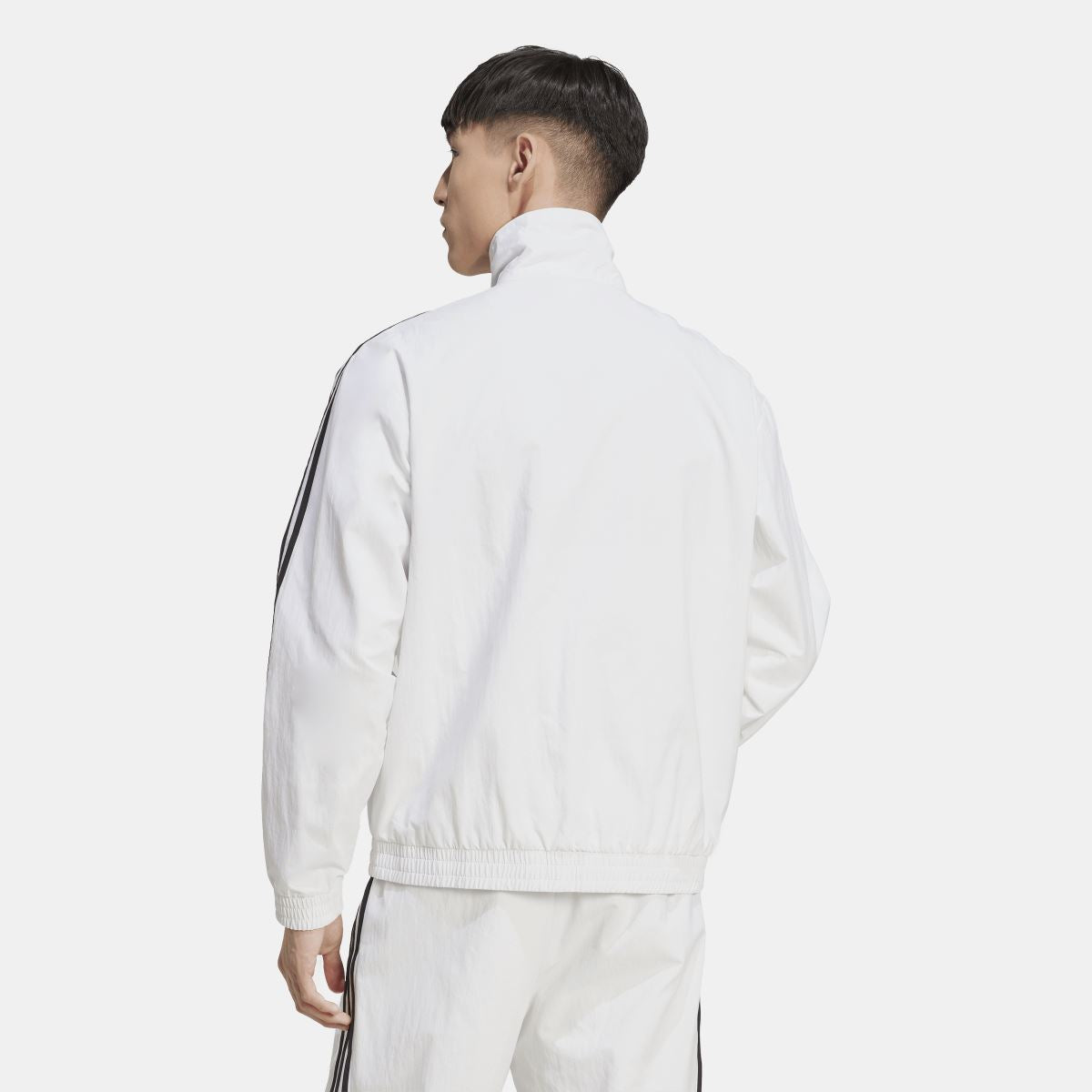 White track jacket back view with stand collar and black triple-stripe sleeves
